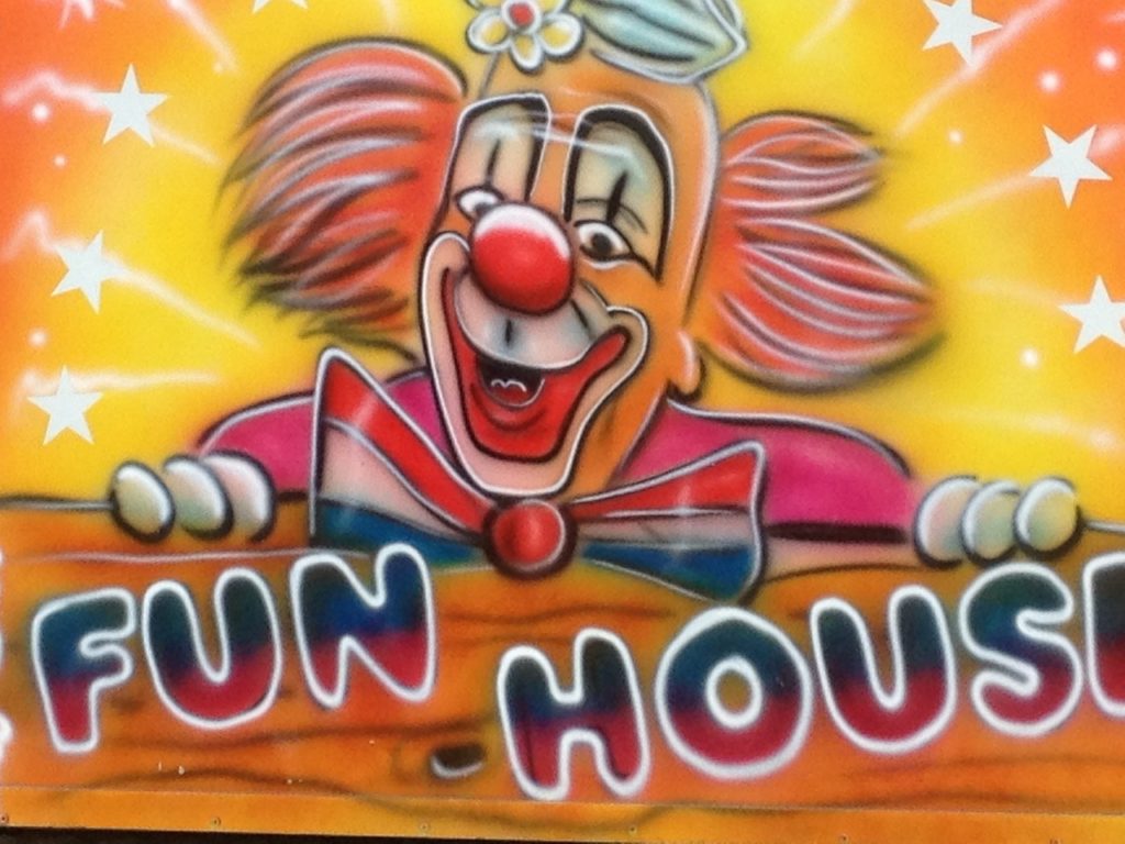 a circus funfair logo as an example of a puzzle illusion room